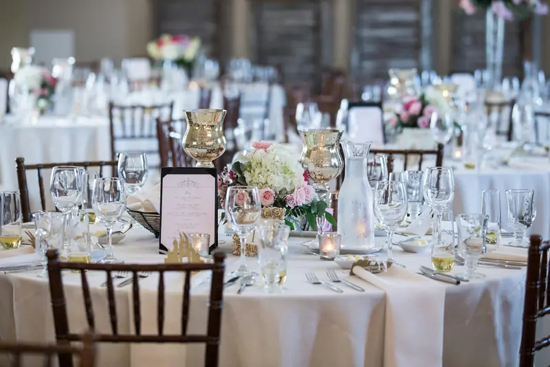 A dinner table set for a party