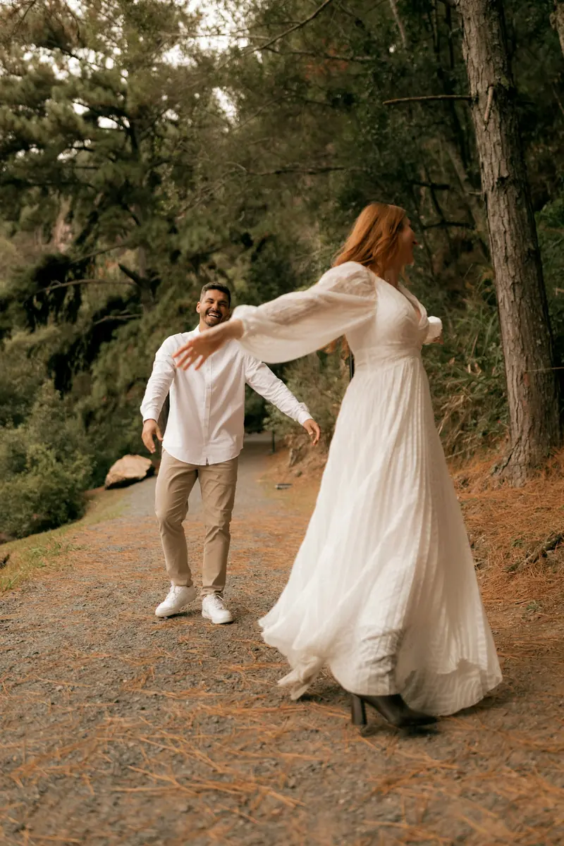 A couple dancing in the trees