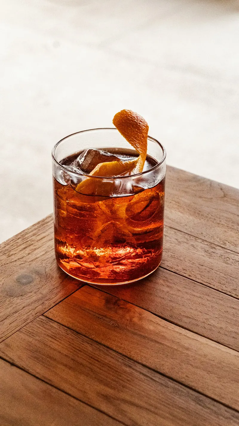 An old fashioned with an orange peel