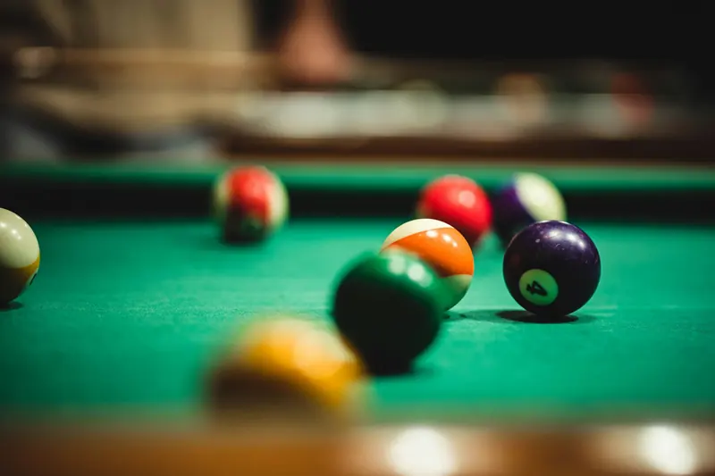 Pool balls on green felt