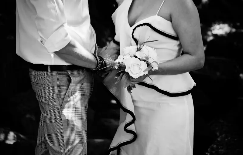 A couple holding hands