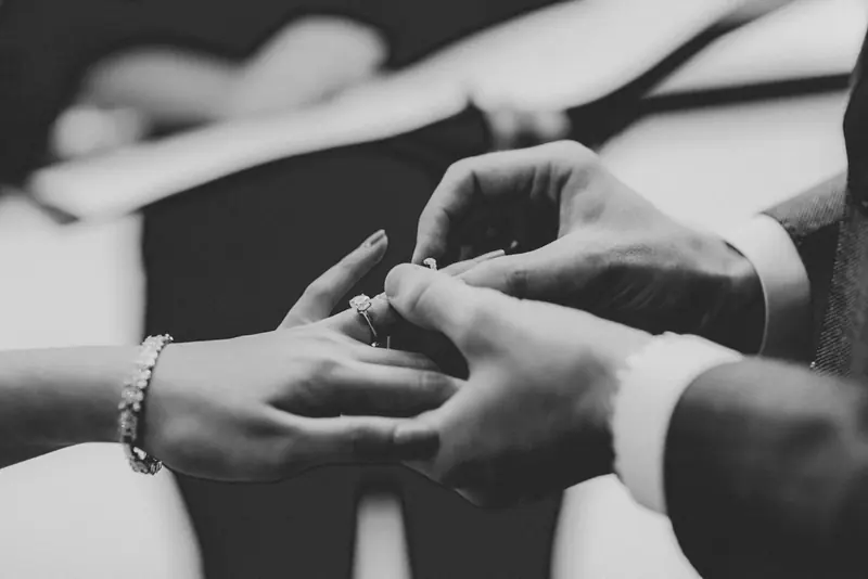 A ring sliding onto a finger