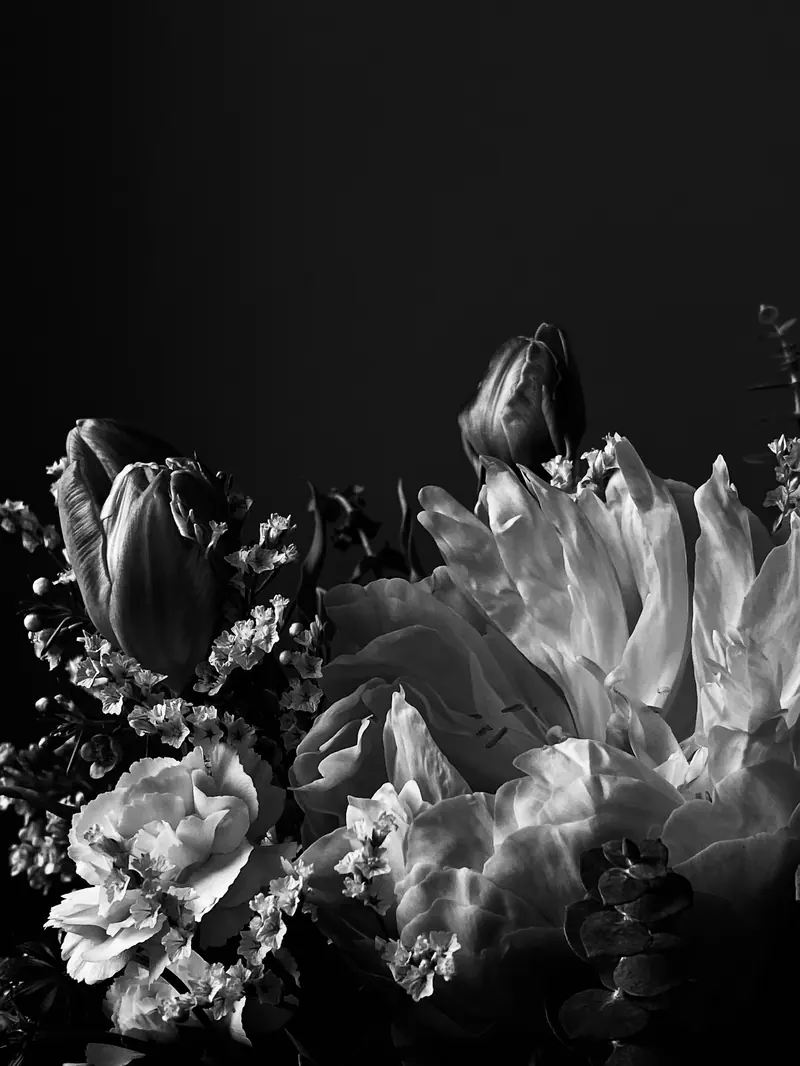 White flowers piled high on a table