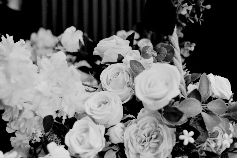 A wide bouquet of roses and berries