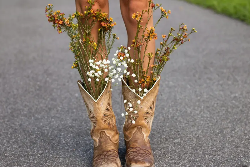 Cowboy boots stuffed with wildflowers