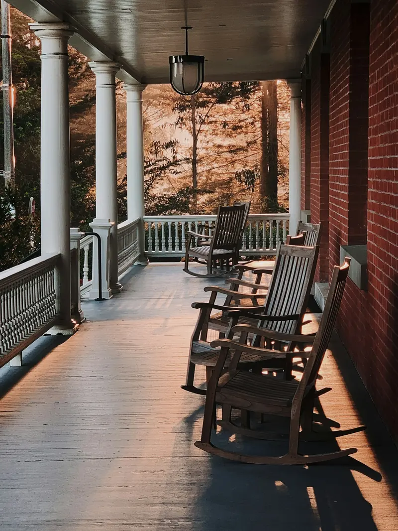 Rocking chairs on a long front porch